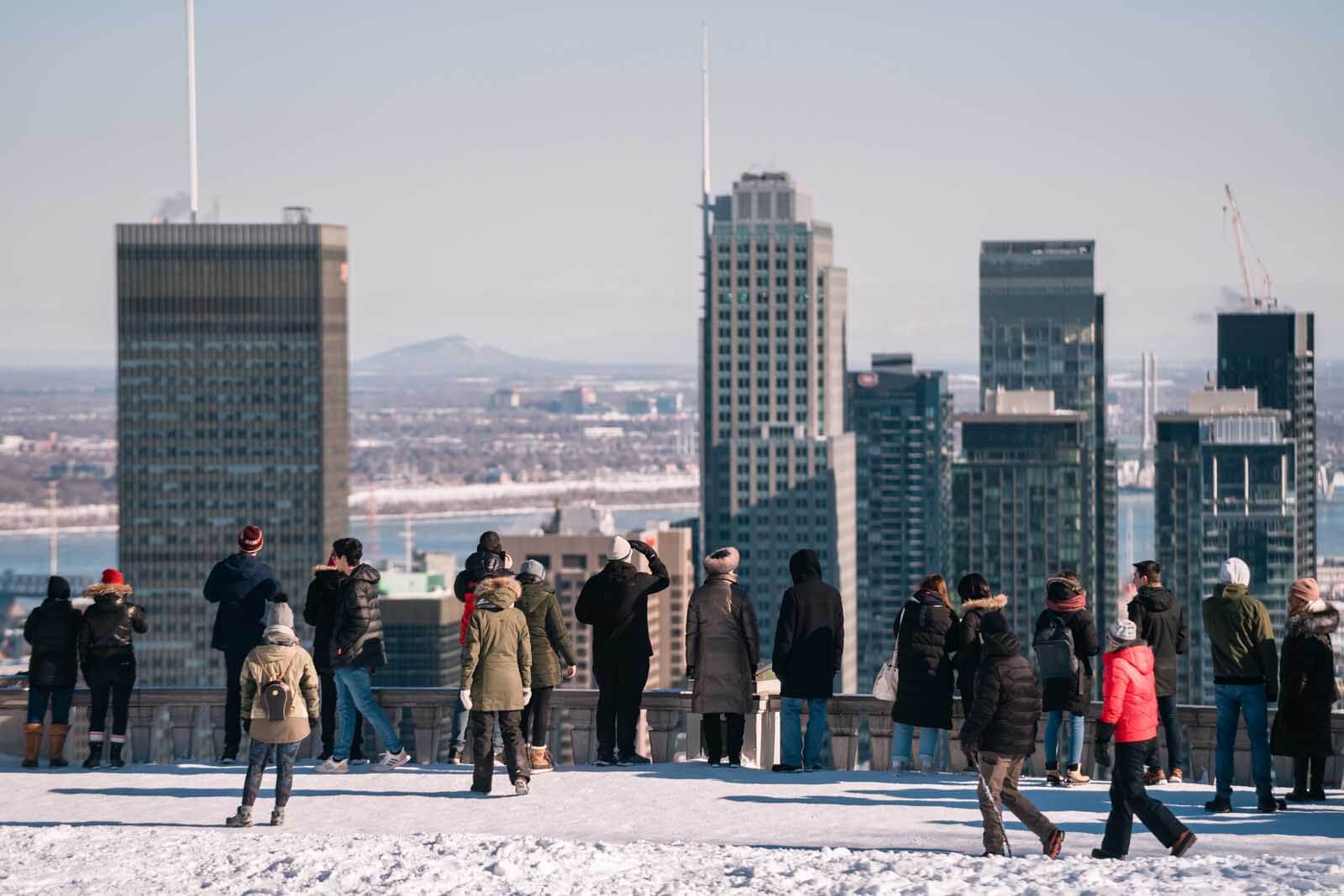 People enjoying the view at Mont Royal of Montreal below