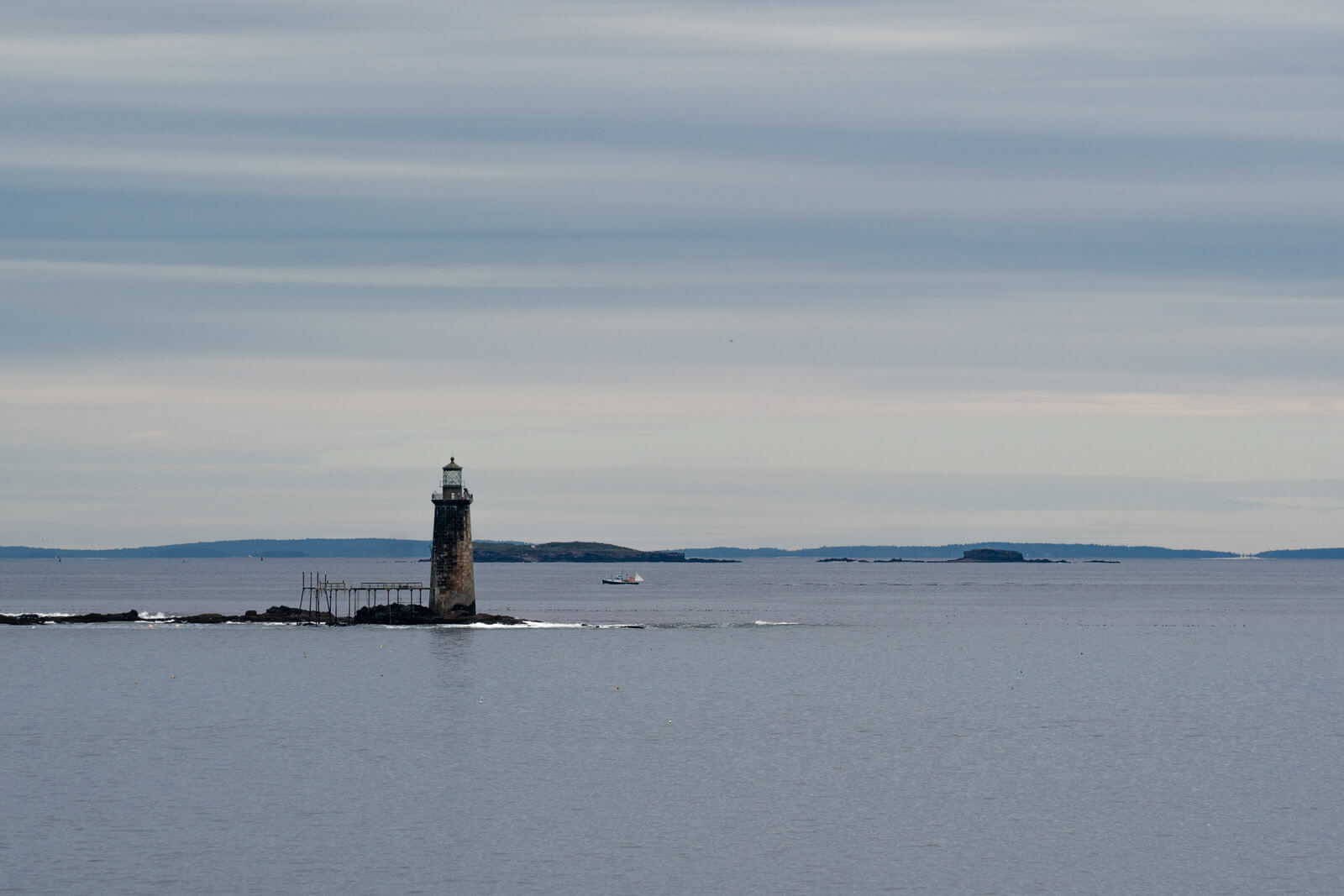 Ram Island Ledge Lighthouse view from Portland Head Light in Casco Bay in Maine