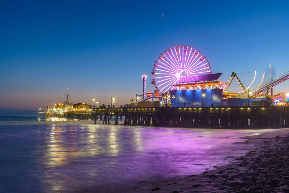 Santa-Monica-Pier-lit-up-at-night-in-Los-Angeles-California