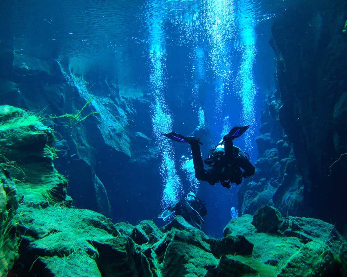 Diving in the Silfra Fissure near Reykjavik Iceland