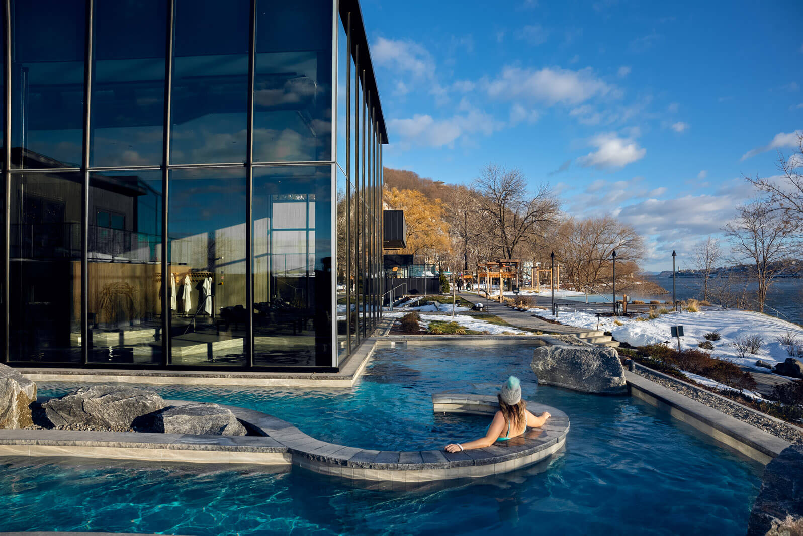 Megan Indoe soaking in a thermal pool at Strom Spa Nordique along the St Lawrence River in Quebec City