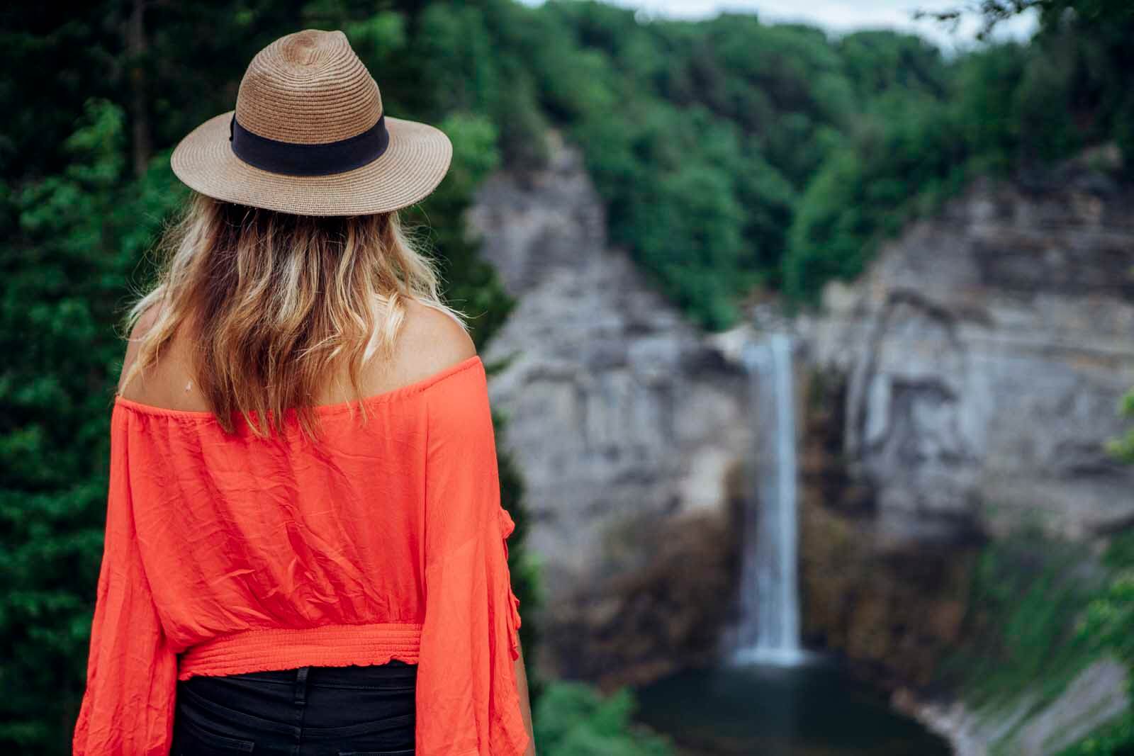 A pretty girl looks at Taughannock Falls 