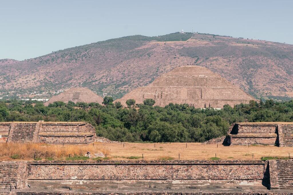 View of Teotihuacan pyramids of the sun and moon from Temple of the feathered serpent
