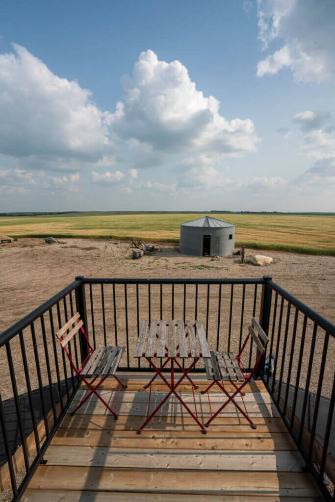 The balcony overlooking the fields at Alive Sky Lodge in Rosetown Saskatchewan Canada
