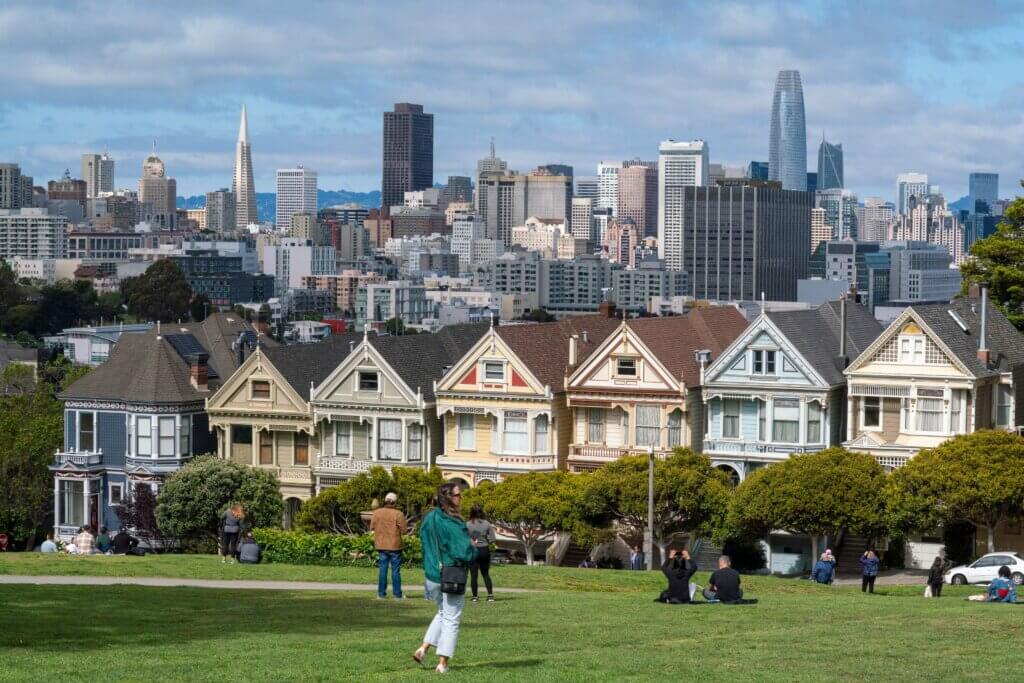 The famous Painted Ladies view with the San Francisco skyline from Alamo Square Park