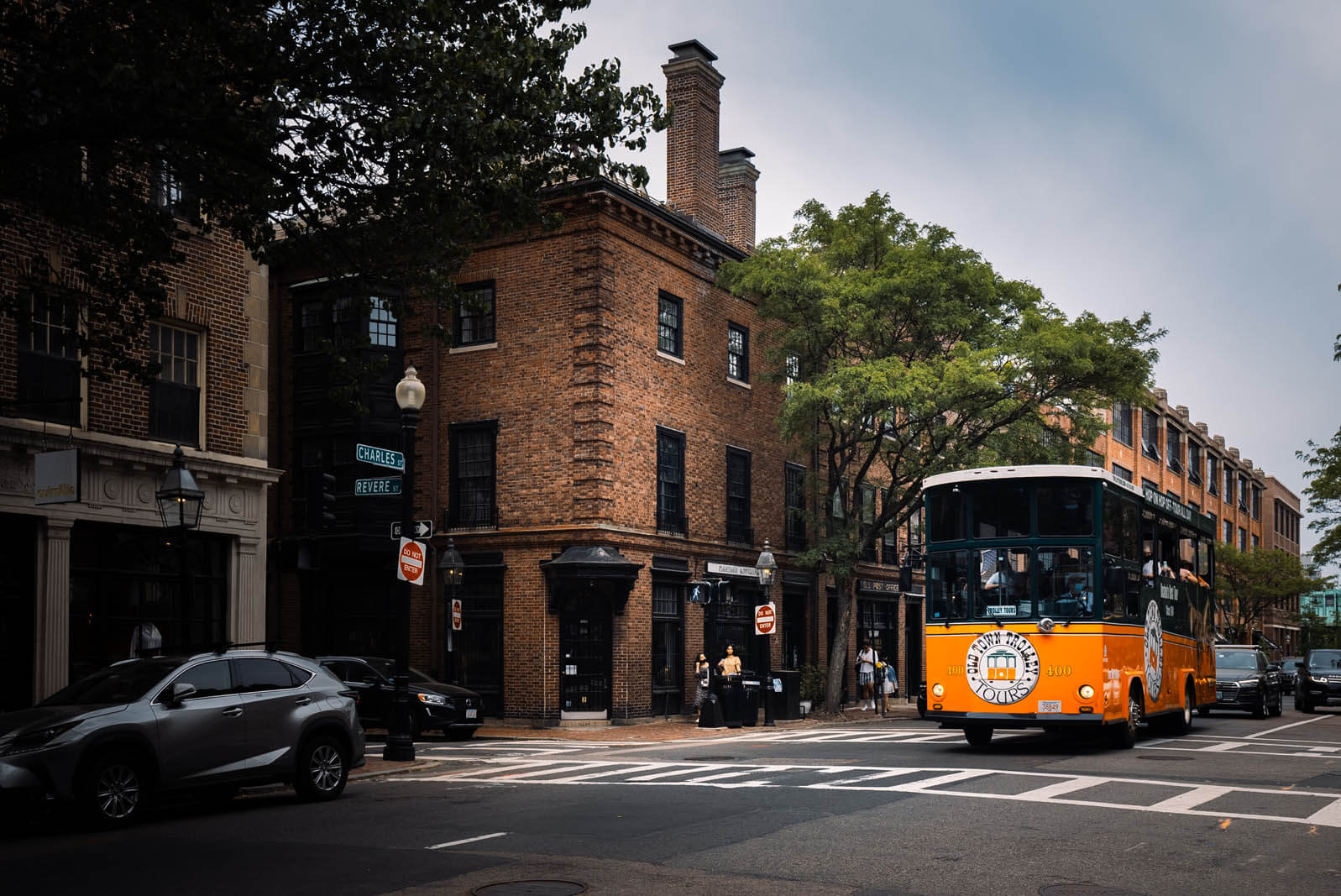 Trolley going down Charles Street in Beacon Hill Boston