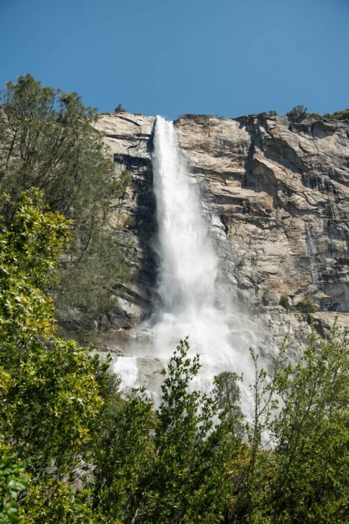 Tueeulala Falls rushing in the spring at Hetch Hetchy Valley in Yosemite National Park in California