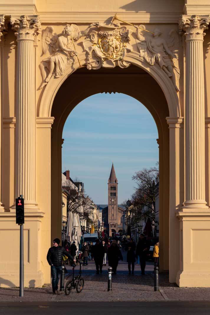 View of Potsdam historic city center through the Brandenburg Gate