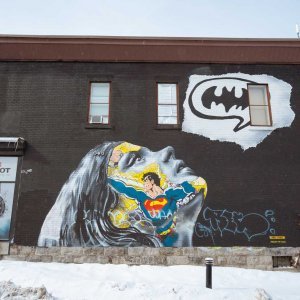 Wonder woman thinking about Batman in Montreal mural