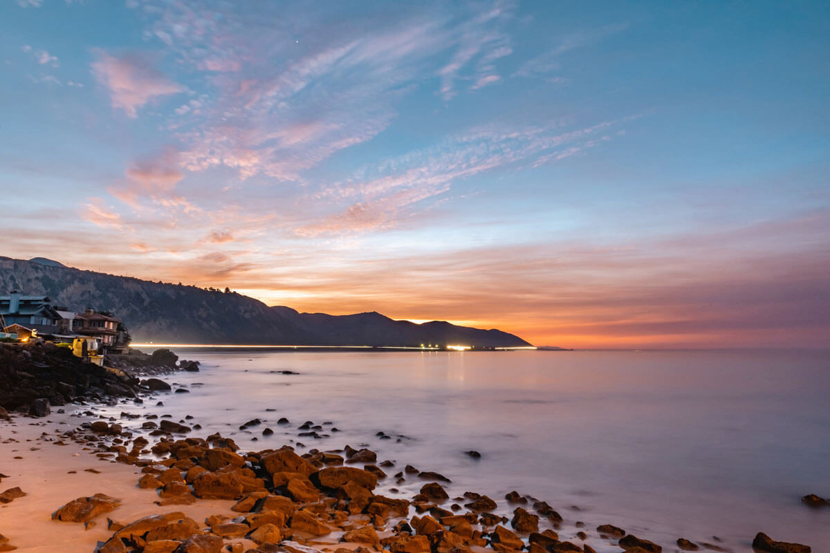 a-colorful-sunrise-along-the-coastline-at-Mussel-Shoals-in-California