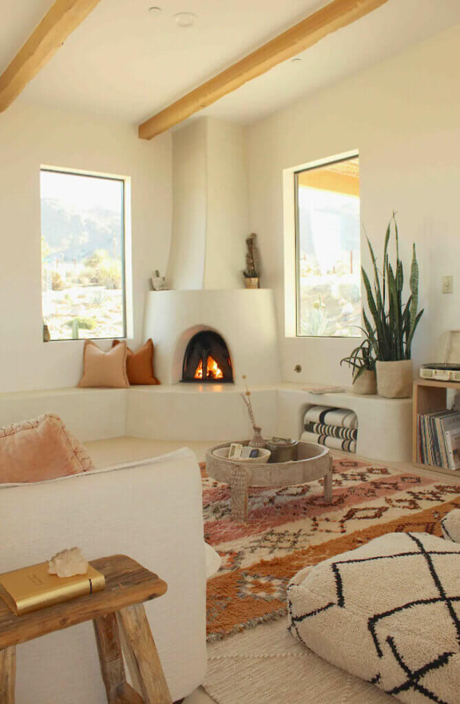 adobe-fireplace-and-living-area-in-Desert-Wild-Airbnb-in-Joshua-Tree