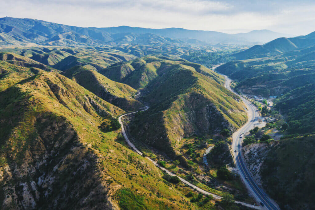 aerial-view-of-the-road-through-the-mountains-in-Santa-Clarita-California
