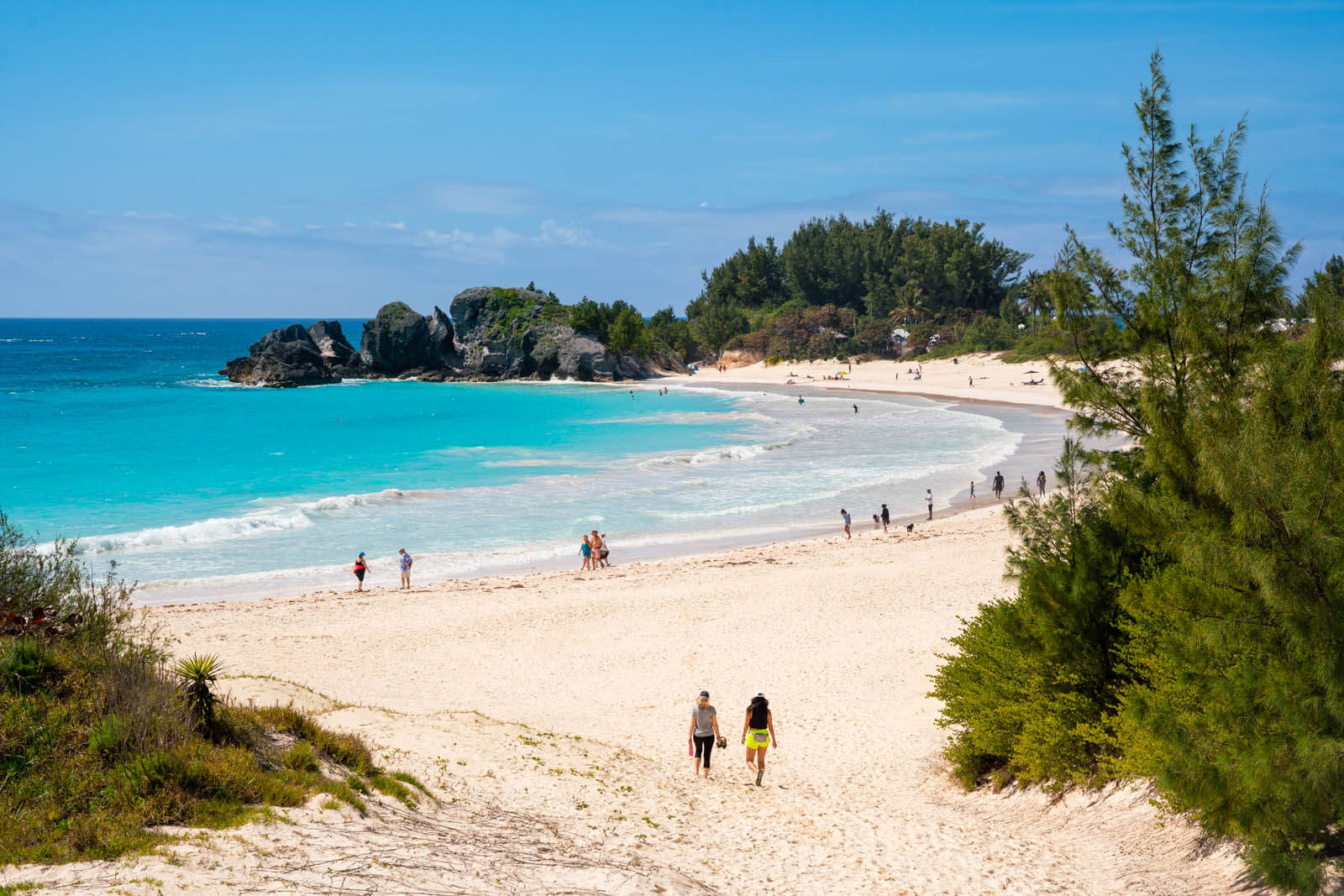 beachgoers enjoying Horseshoe Bay in Bermuda