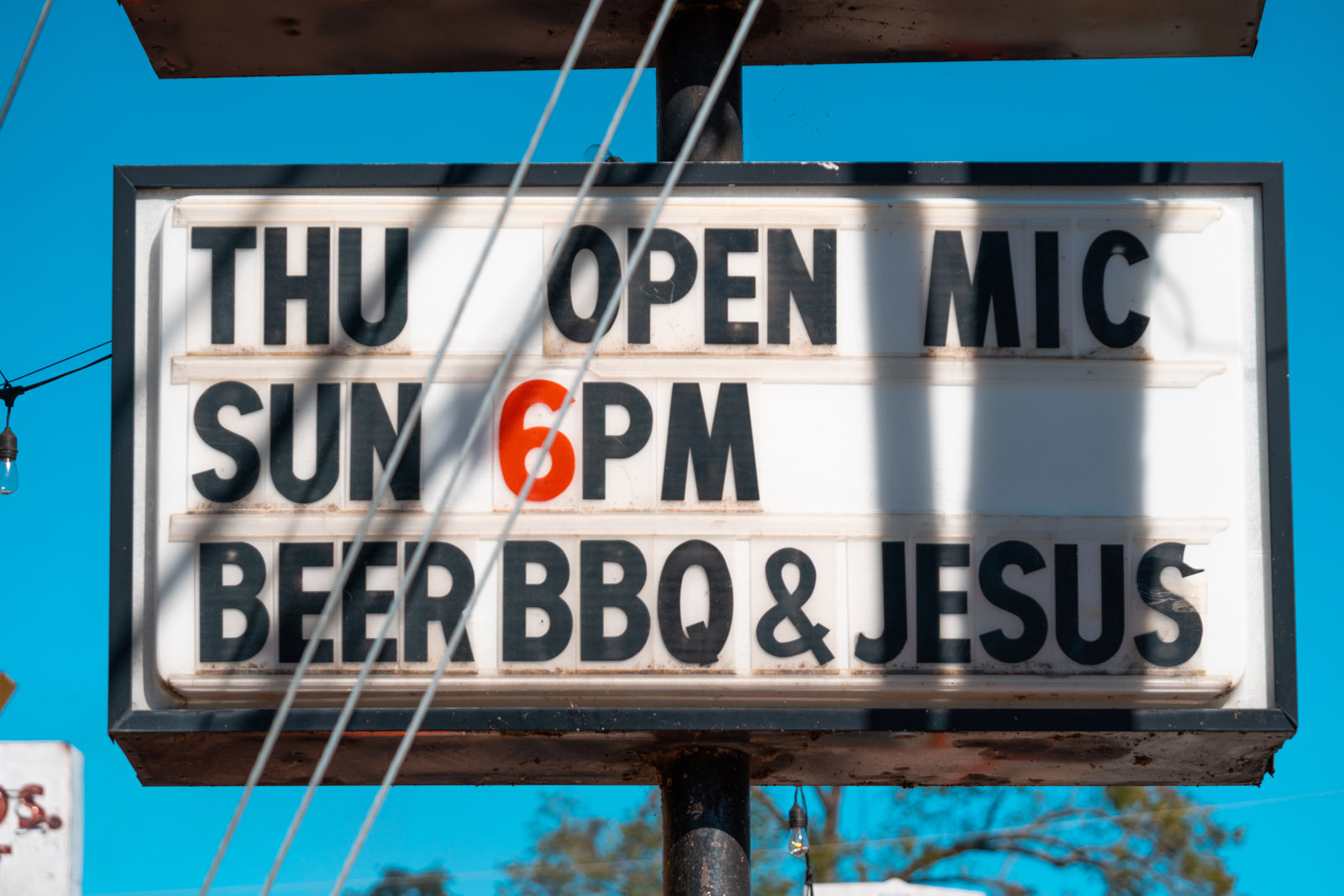 beer bbq and jesus sign at pucketts of leipers fork in tennessee