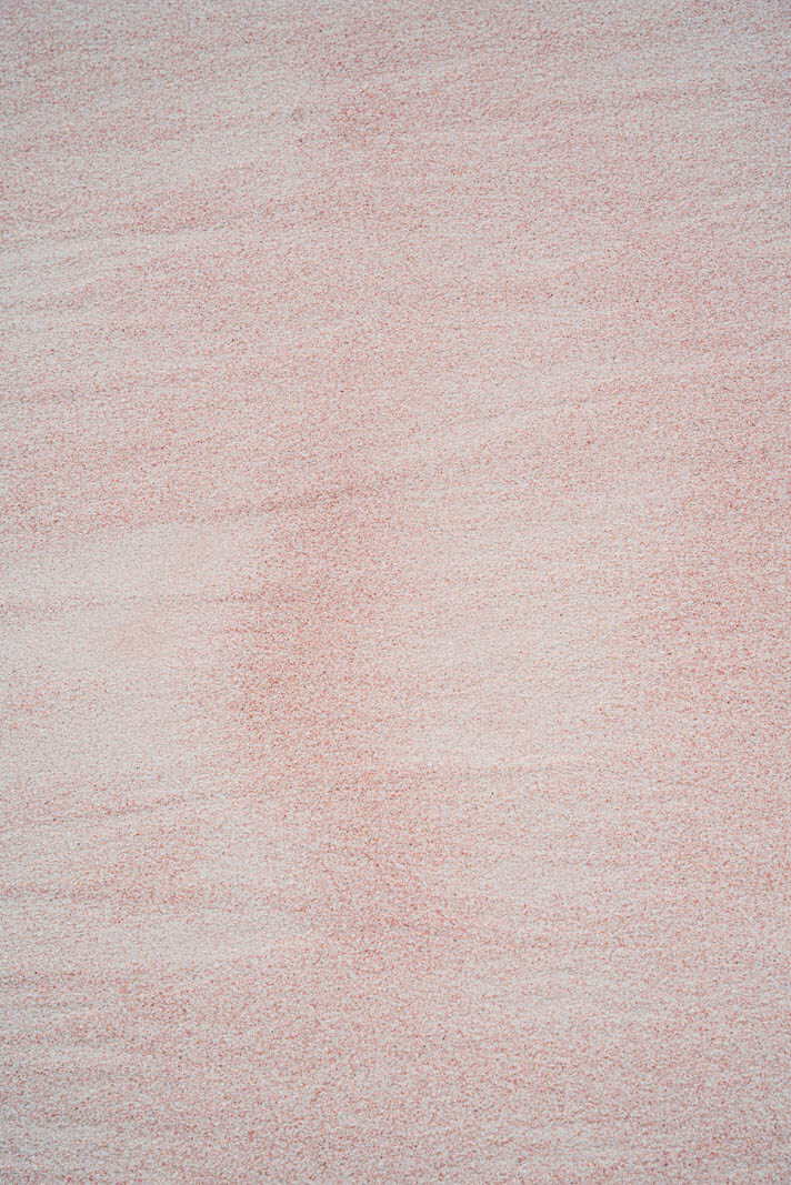 close up of the pink sand in Bermuda at Horseshoe Bay Beach