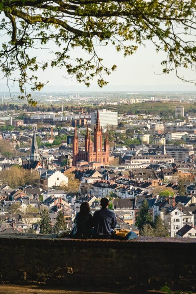 couple enjoying the views of Wiesbaden from Löwenterrasse observation area