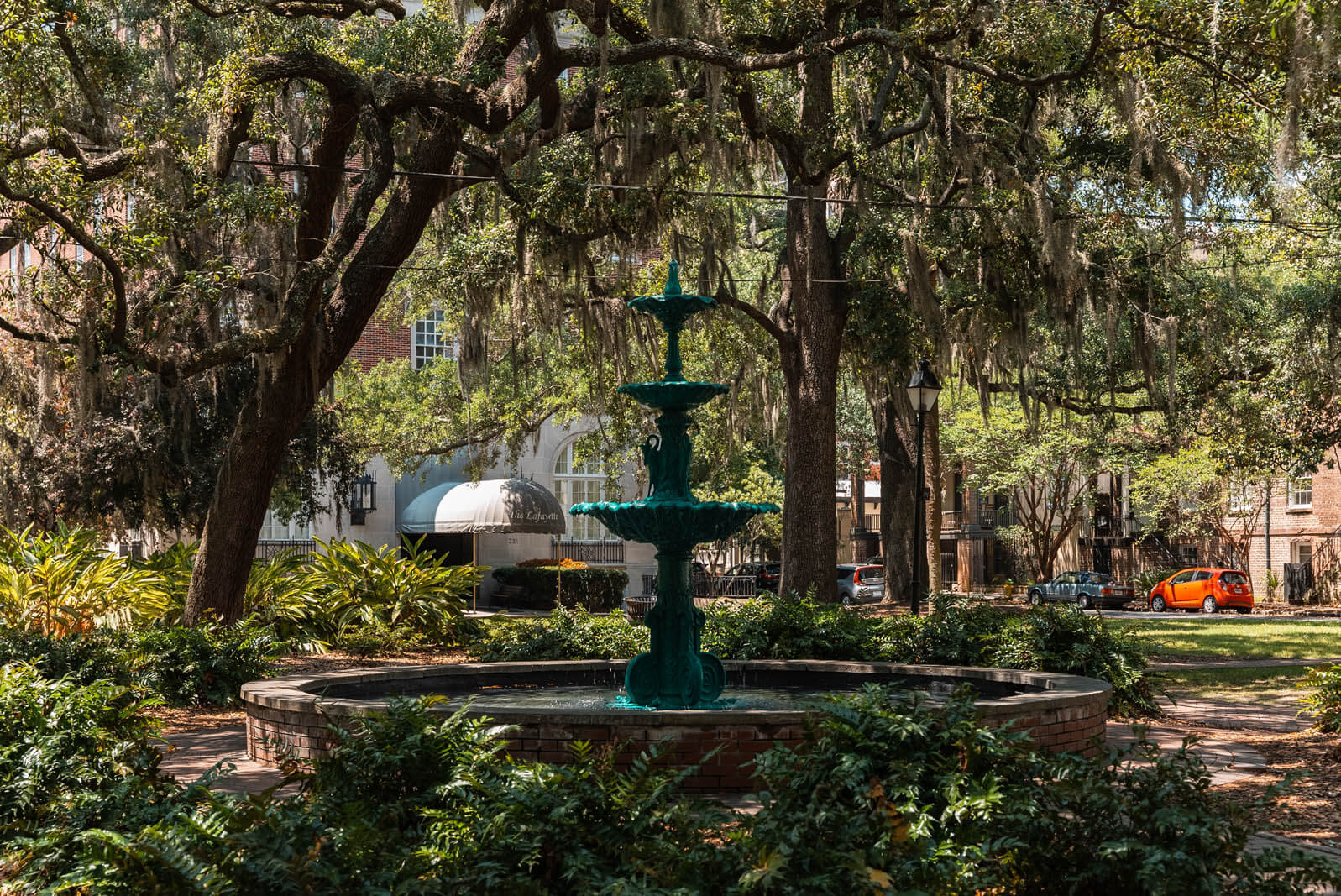 green fountain in the center of Lafayette Square in Savannah