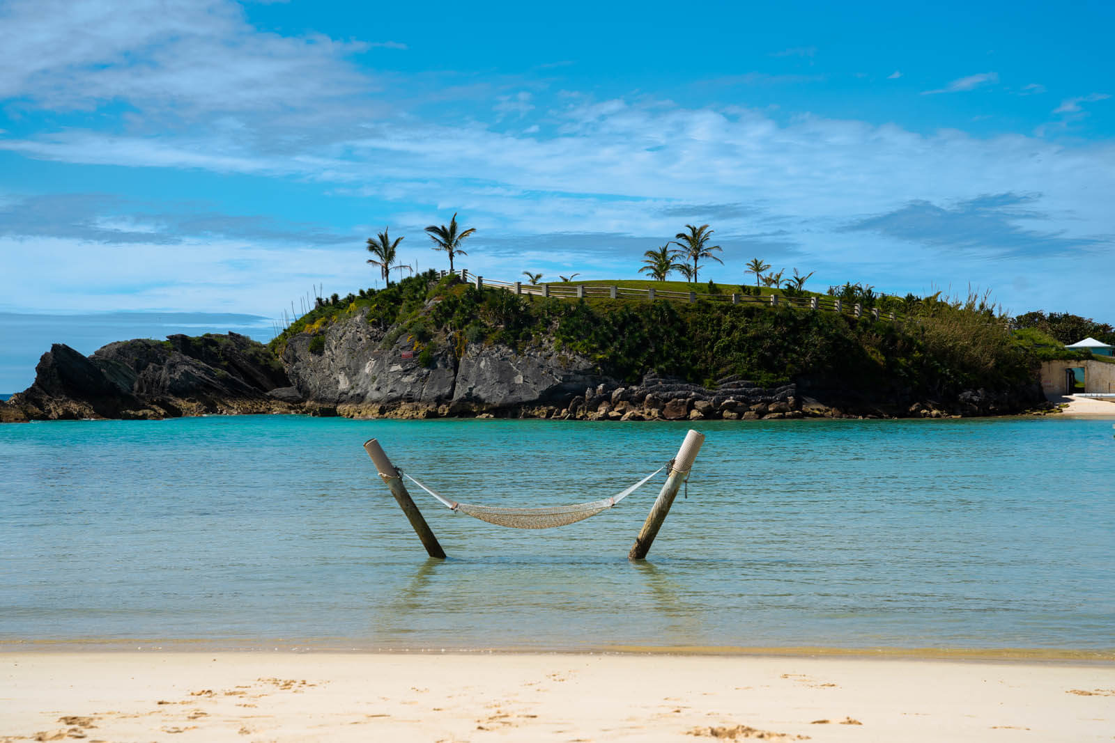 hammock over the blue water at Sinky Bay Beach Princess Hamilton Beach Club in Bermuda