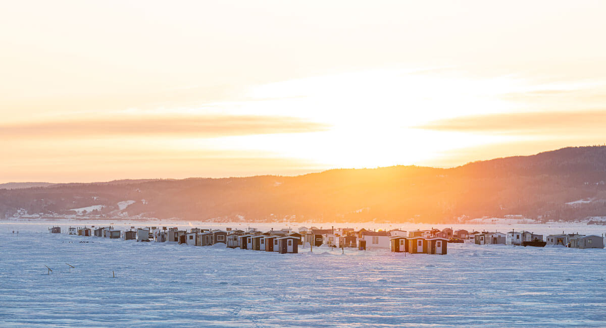 ice-fishing-village-on-the-saguenay-fjord-in-la-baie-quebec-in-winter in the Saguenay-lac-Saint-Jean region
