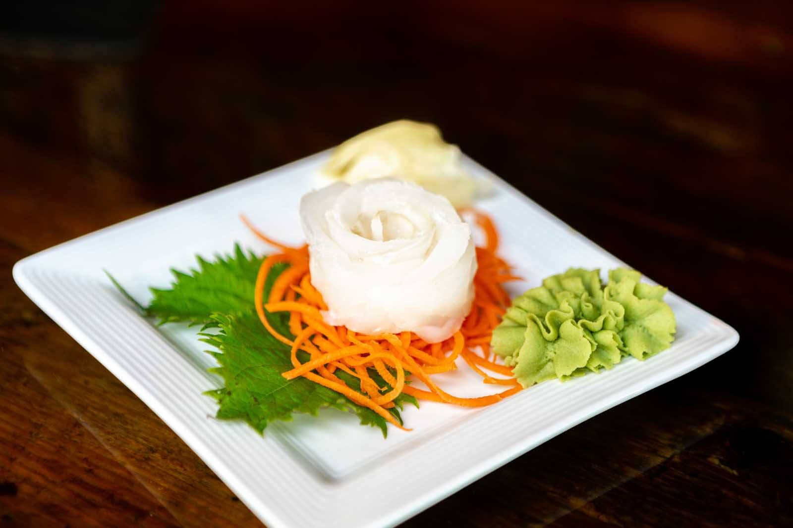 lionfish sashimi with gorgeous presentation at Castaway waterfront restaurant and sushi bar