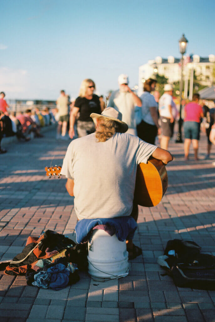 live-musician-playing-music-right-before-the-sunset-celebration-at-mallory-square-one-of-the-best-things-to-do-in-Key-West-Florida