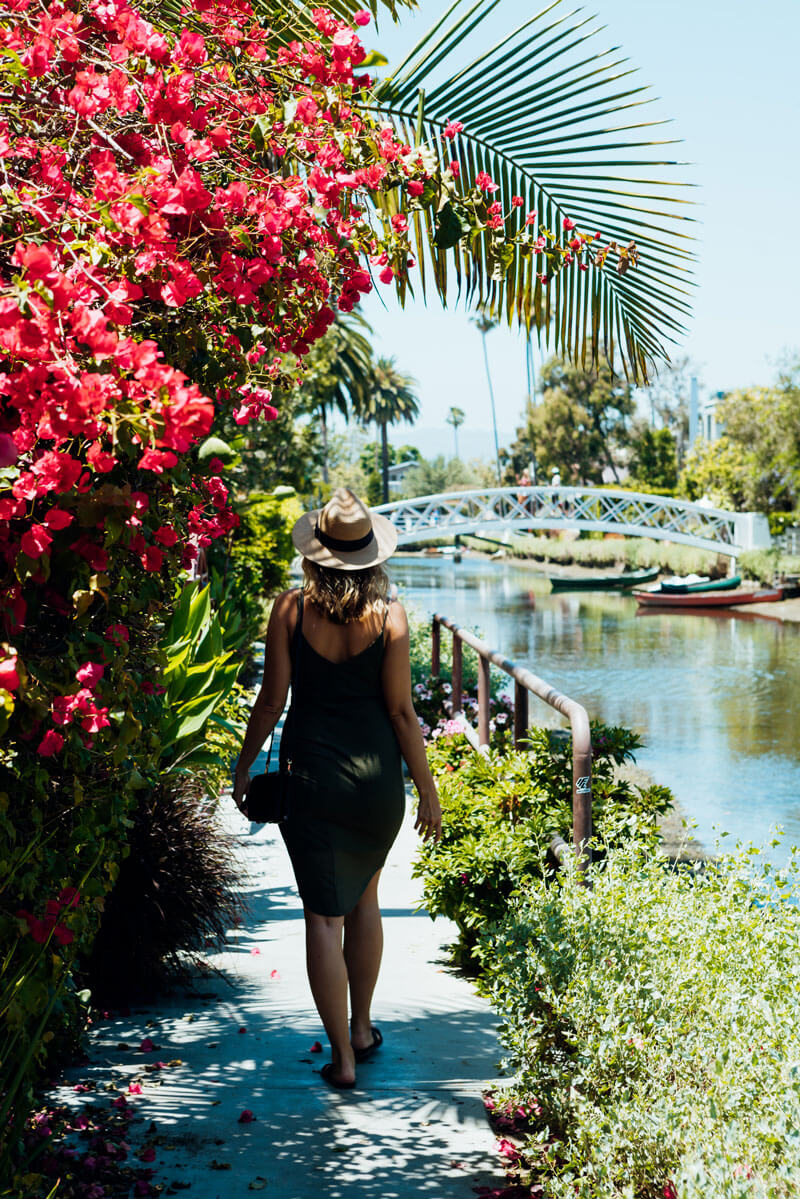 megan-walking-through-the-venice-beach-canals-in-Los-Angeles-California