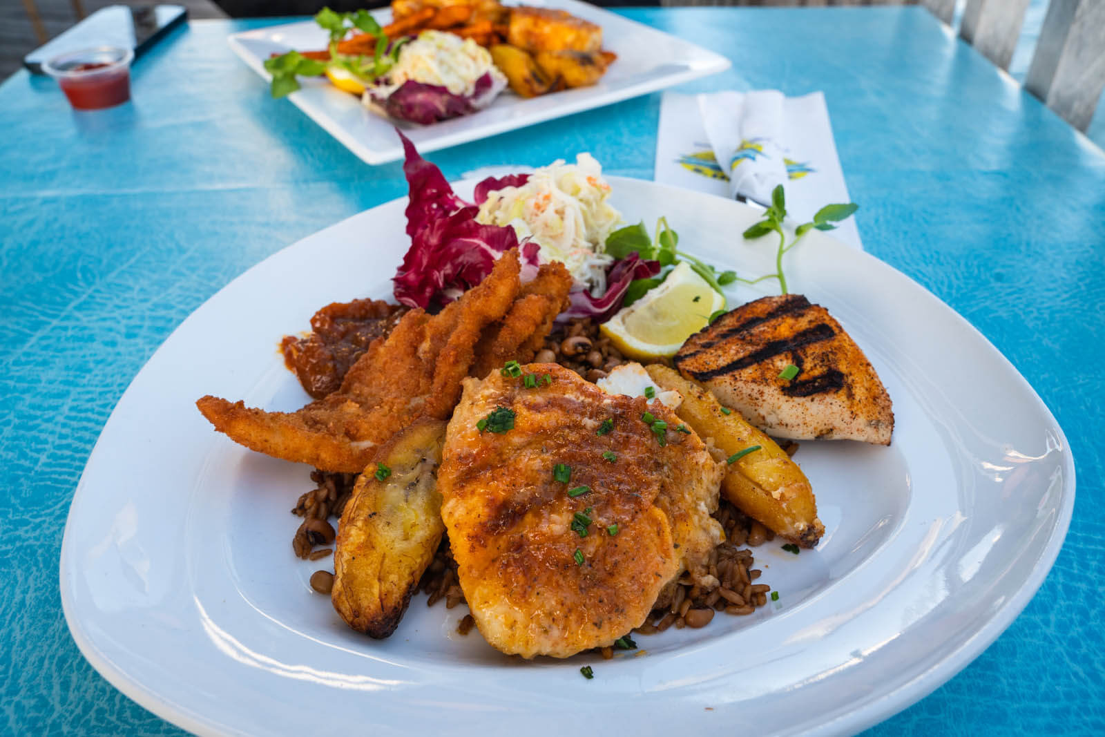 pan fried rockfish dinner plate at Wahoos Bistro in St Georges Bermuda