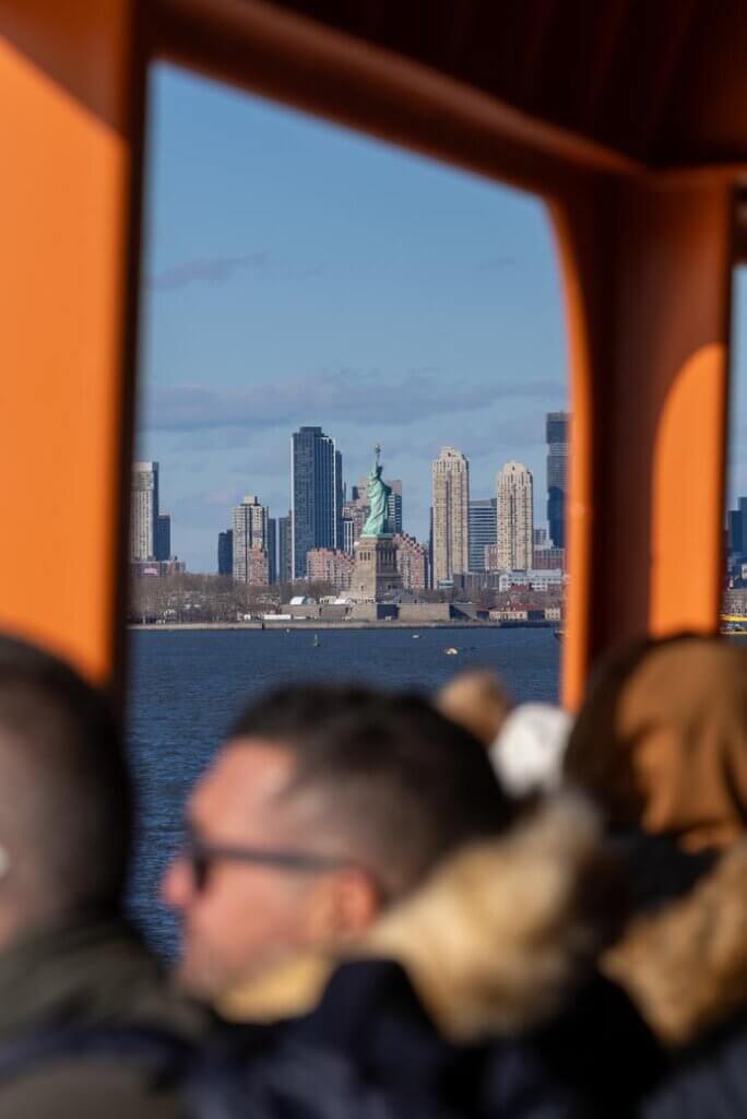 passing the Statue of Liberty from the Staten Island Ferry in NYC