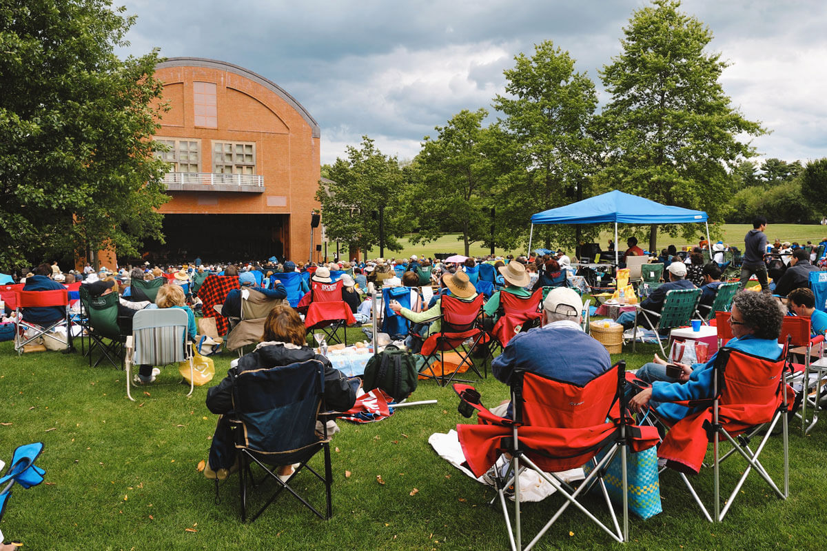 people-enjoying-a-performance-at-Tanglewood-in-Lenox,-MA-in-the-Berkshires