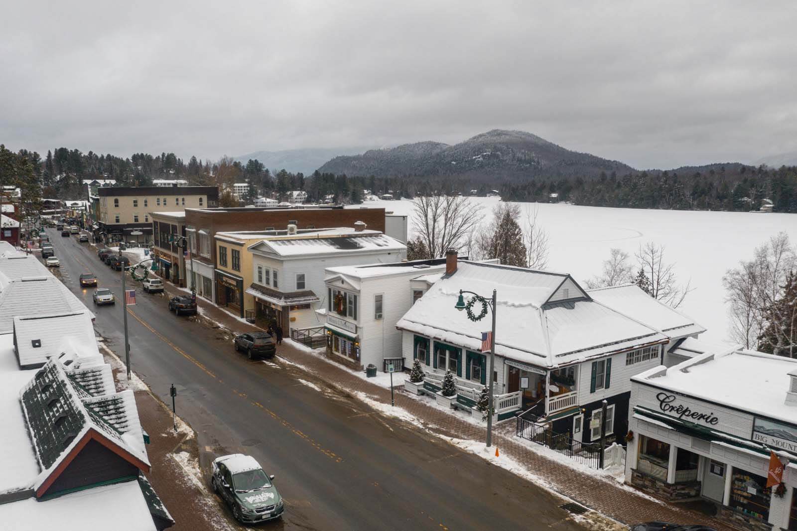shops along the main street in downtown Lake Placid in winter
