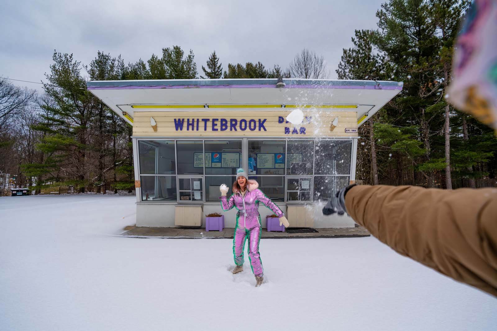 snowball fight at White Brook Dairy Bar in the Adirondacks at winter