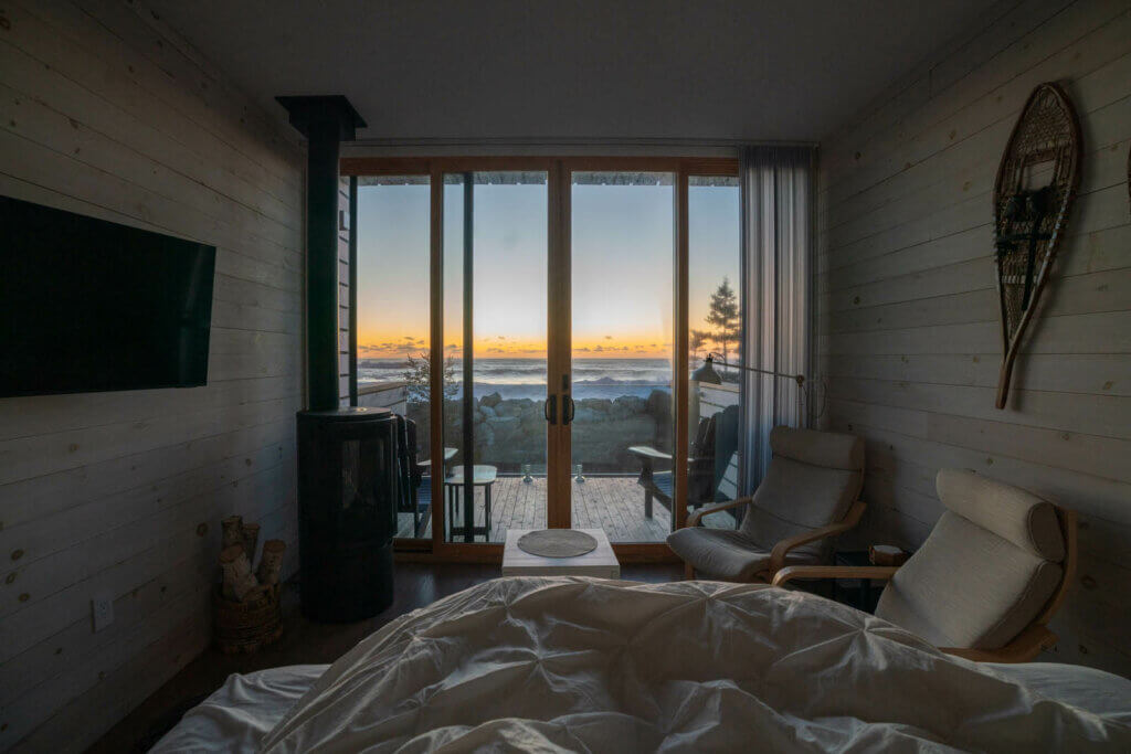 sunrise from our bed in the oceanfront treehouse at White Point Beach Resort in Nova Scotia