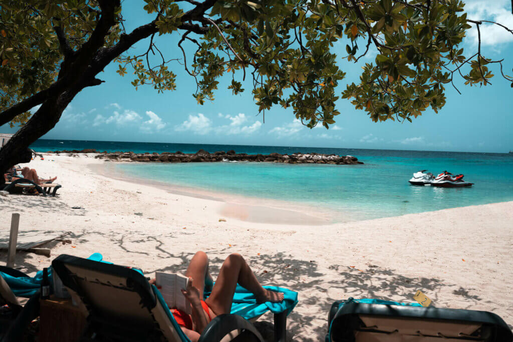 view of Jan Thiel Beach in Curacao from Zanzibar Beach Bar chairs