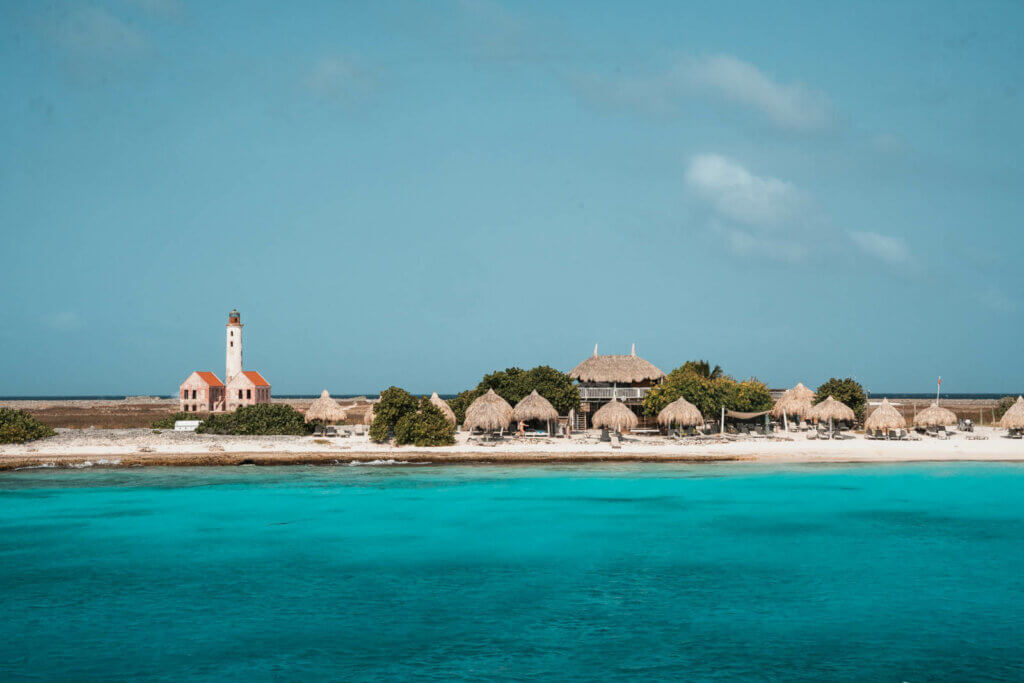 view of Klein Curacao and lighthouse from the boat in Curacao