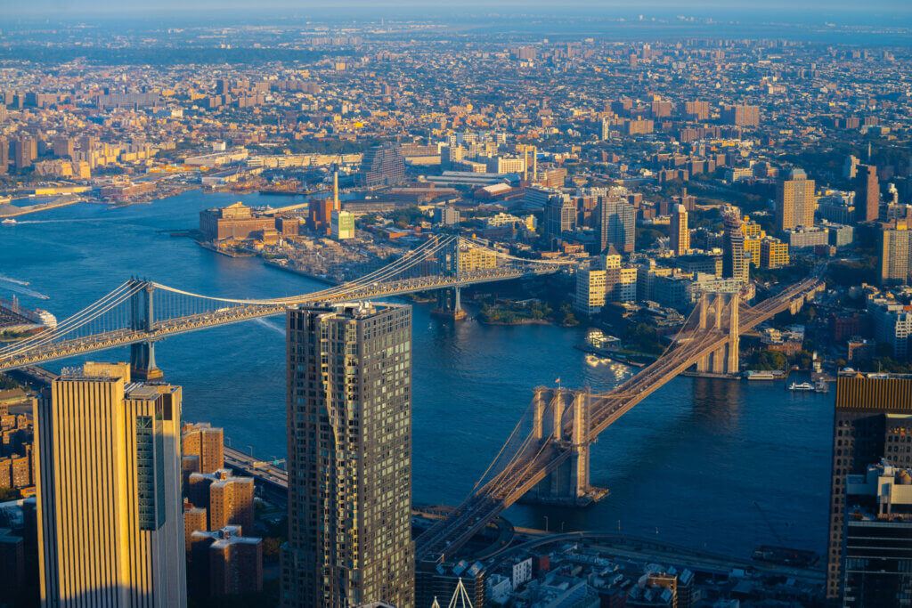 view of the Brooklyn Bridge and Manhattan Bridge from One World Observatory in the Financial District NYC