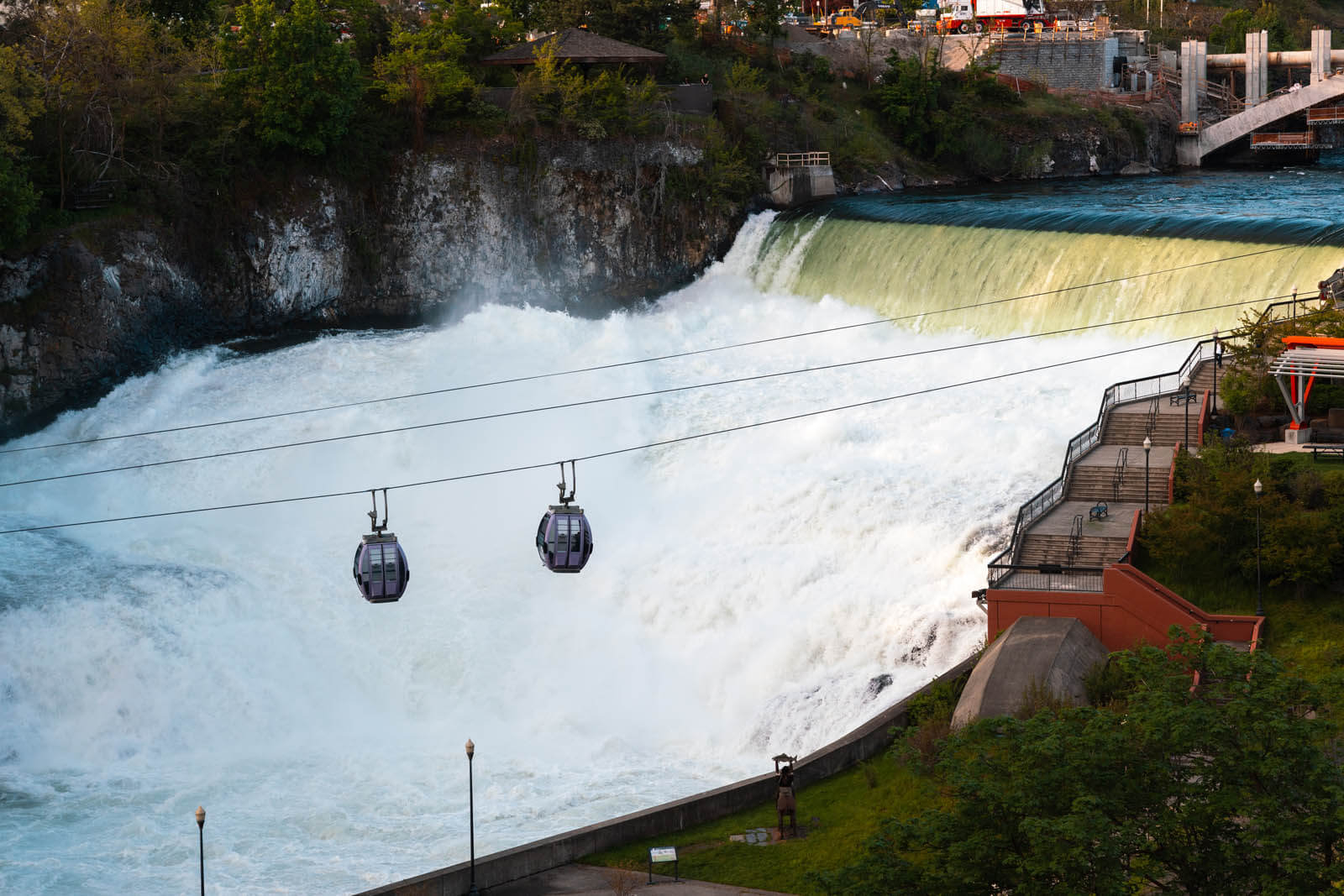 view of the Numerica Skyride over the raging Spokane Falls in Washington