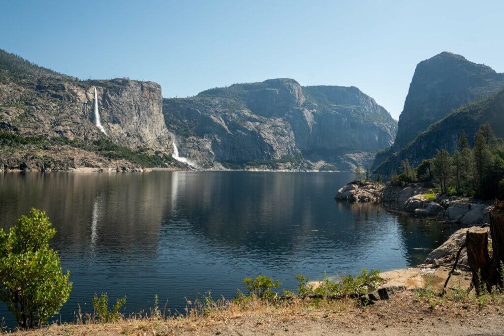 view of the waterfalls at Hetch Hetchy Reservoir in Yosemite National Park in Tuolumne County California